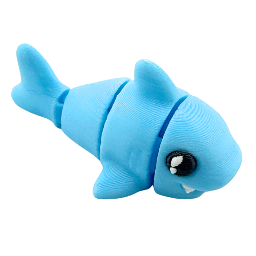 Finn the Shark Flexling toy in glowing blue SFX edition, bendable fidget collectible for kids ages 6 and up