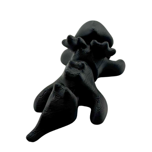 Ember the Dragon Flexling toy in dark gray with black eyes, poseable dragon figure from limited Original Crew edition