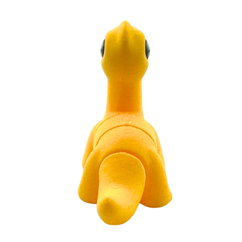 Monty the Brachiosaurus yellow poseable dinosaur figure wearing bow tie from Flexlings Original Crew collection