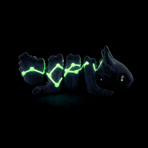 Lumi the Axolotl Constellation Edition Flexlings toy with glow-in-the-dark Lacerta constellation pattern on pink axolotl figure