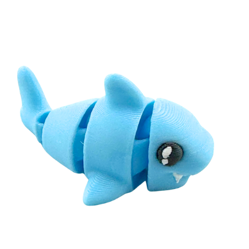 Finn the Shark Flexling toy in glowing blue SFX edition, bendable fidget collectible for kids ages 6 and up