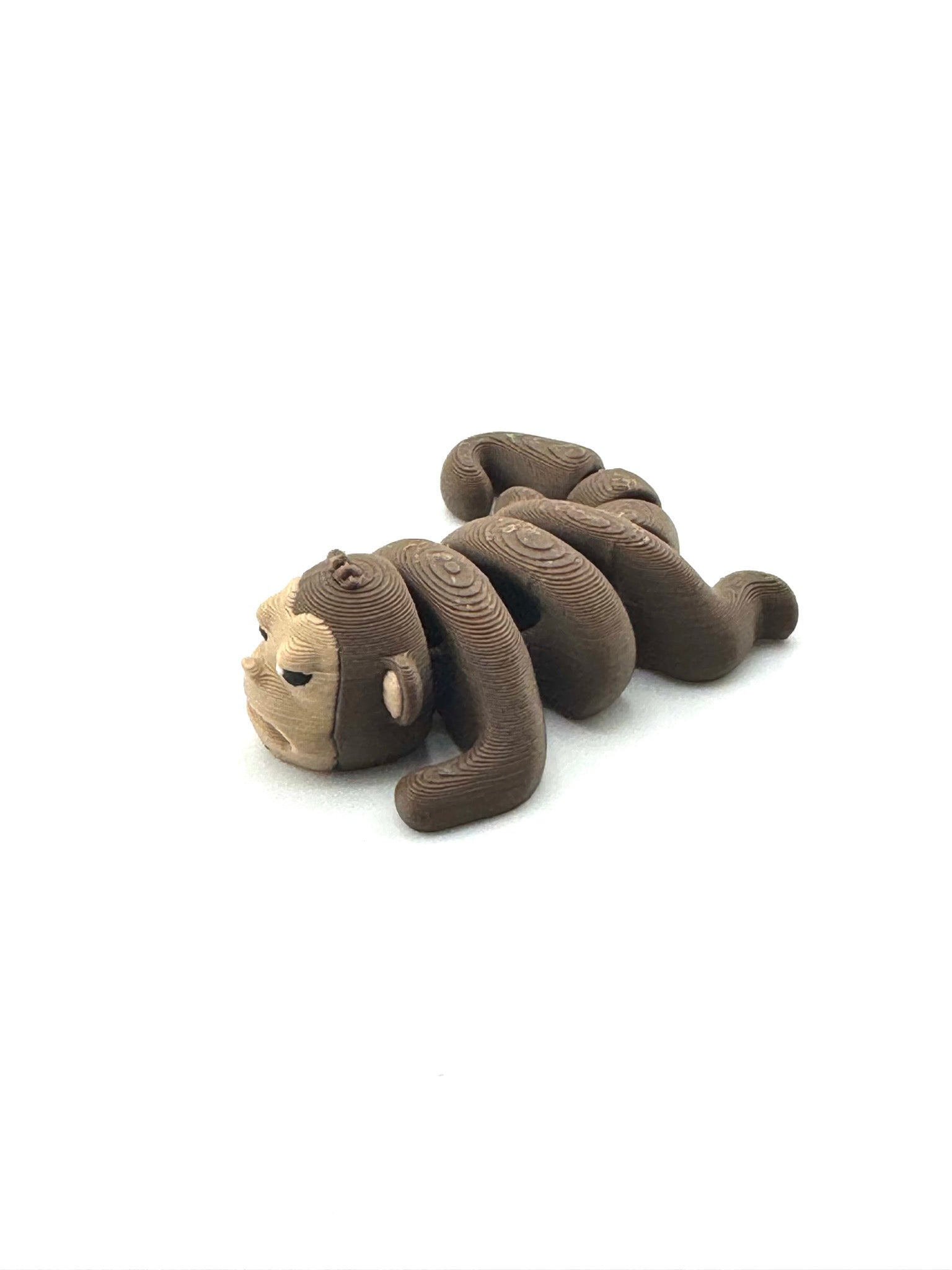 Tango the Monkey Grumpy Edition Flexlings collectible fidget toy with grumpy expression