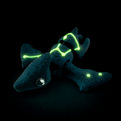 Lamar the Pteranodon Constellation Edition glow in the dark Flexling toy with galaxy coloring and Musca star pattern