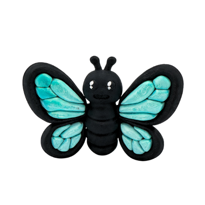 Aurora Butterfly Monarch Queen Flexling toy with orange glow-in-the-dark wings, ultra-limited edition of 23