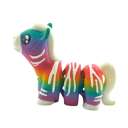 Debra the Zebra Rainbow Edition Flexling toy with gradient colors flowing across white stripes, palm-sized collectible