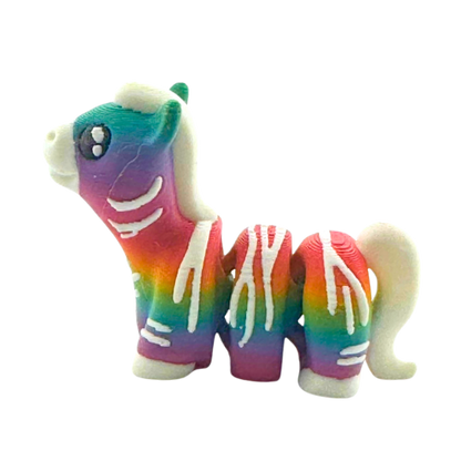 Debra the Zebra Rainbow Edition Flexling toy with gradient colors flowing across white stripes, palm-sized collectible