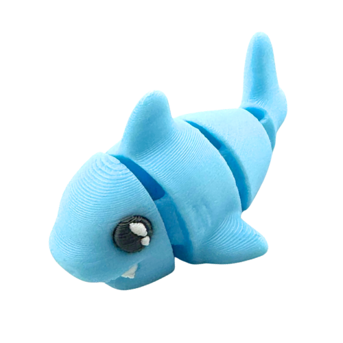 Finn the Shark Flexling toy in glowing blue SFX edition, bendable fidget collectible for kids ages 6 and up
