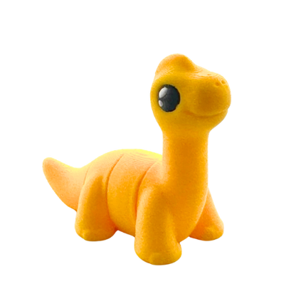 Monty the Brachiosaurus yellow poseable dinosaur figure wearing bow tie from Flexlings Original Crew collection