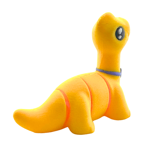 Monty the Brachiosaurus Flexling toy in yellow with purple fancy bow tie, limited edition collectible dinosaur figure