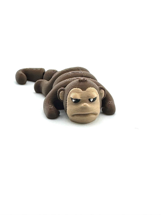 Tango the Monkey Grumpy Edition Flexlings collectible fidget toy with grumpy expression