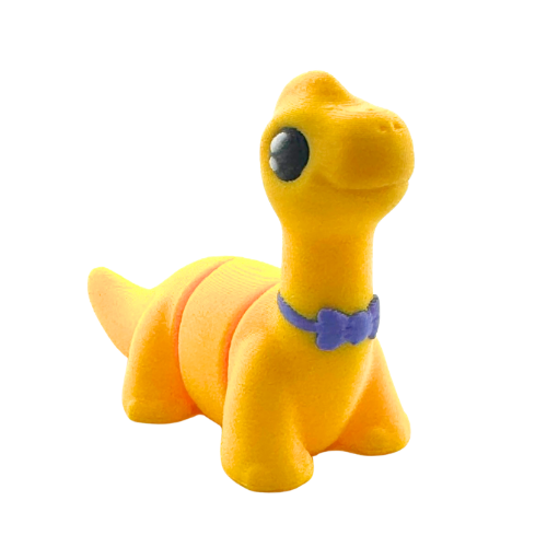 Monty the Brachiosaurus Flexling toy in yellow with purple fancy bow tie, limited edition collectible dinosaur figure