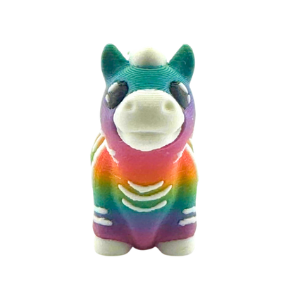 Debra the Zebra Rainbow Edition Flexling toy with gradient colors flowing across white stripes, palm-sized collectible