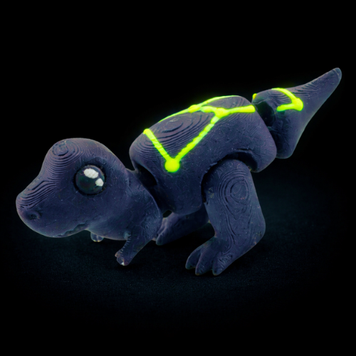 Roary the T-Rex Constellation Edition glow-in-the-dark poseable dinosaur toy with cosmic star pattern design