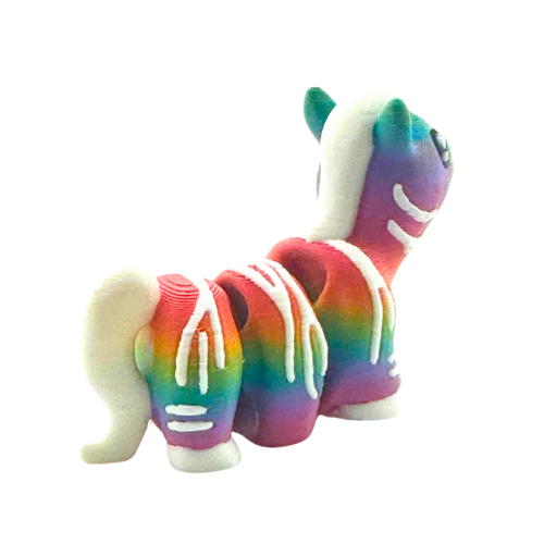 Debra the Zebra Rainbow Edition Flexling toy with gradient colors flowing across white stripes, palm-sized collectible