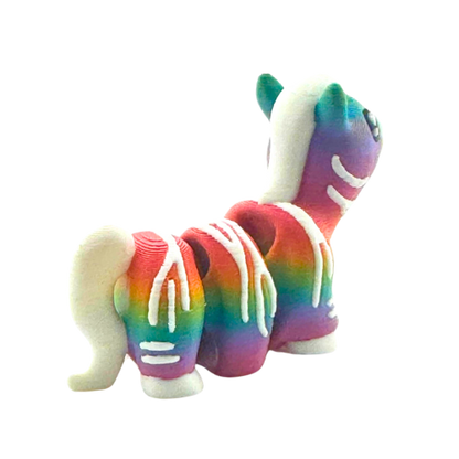Debra the Zebra Rainbow Edition Flexling toy with gradient colors flowing across white stripes, palm-sized collectible