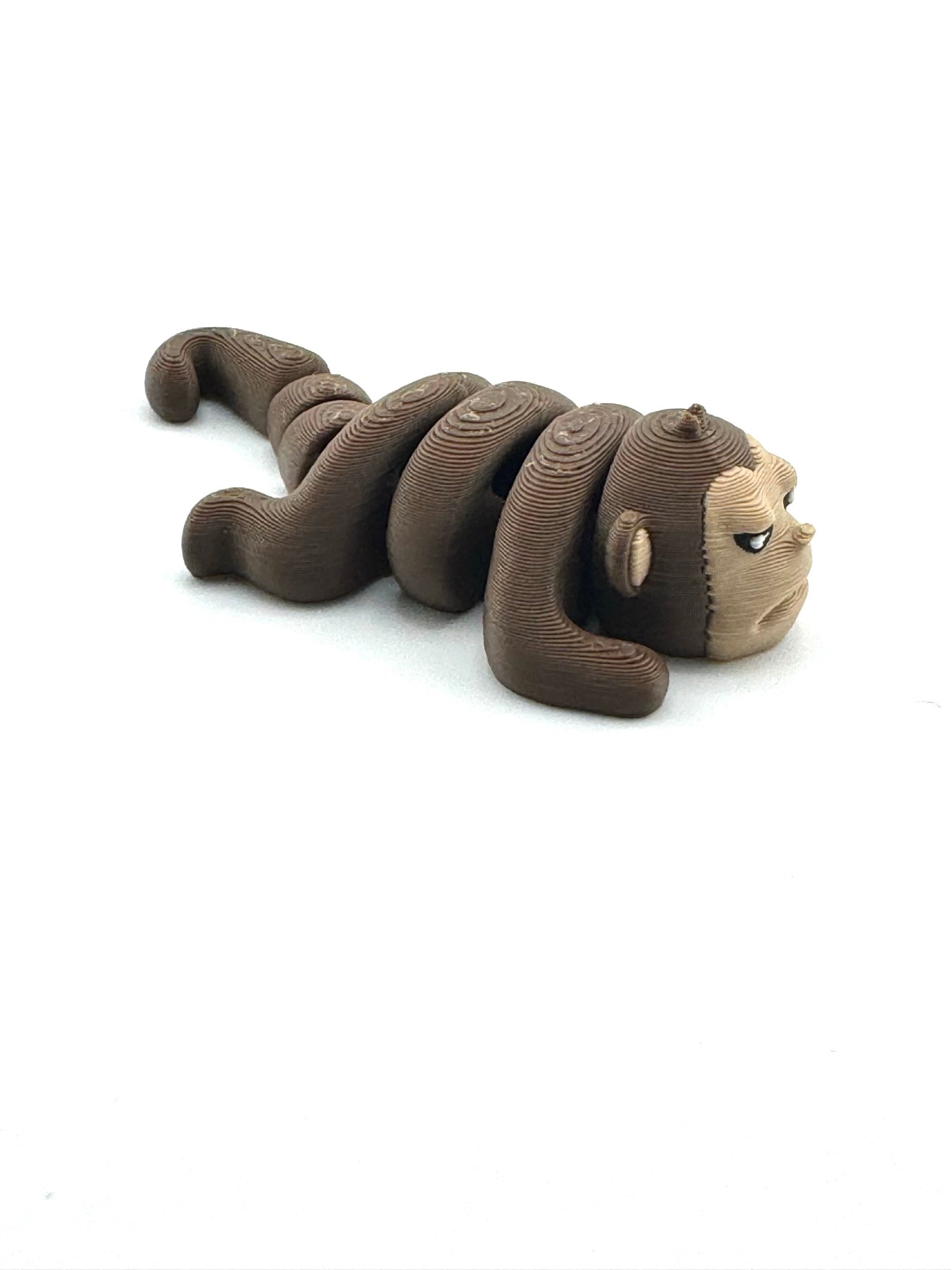 Tango the Monkey Grumpy Edition Flexlings collectible fidget toy with grumpy expression