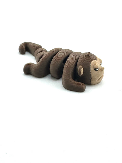 Tango the Monkey Grumpy Edition Flexlings collectible fidget toy with grumpy expression
