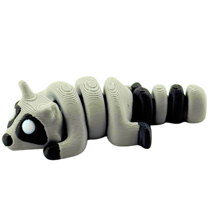 Bandit the Raccoon Flexlings toy, grey articulated raccoon figure from limited Original Crew edition