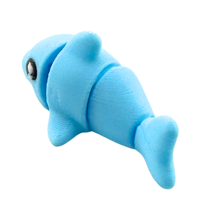 Finn the Shark Flexling toy in glowing blue SFX edition, bendable fidget collectible for kids ages 6 and up