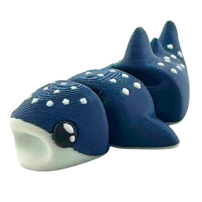 Marlow the Whaleshark poseable toy figure in dark blue with articulated tail and fins, Original Crew edition