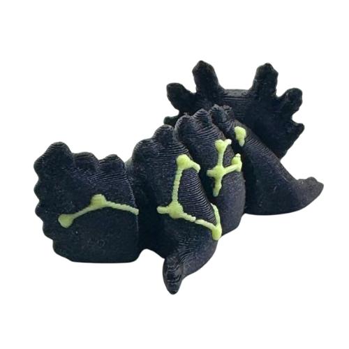 Lumi the Axolotl Constellation Edition Flexlings toy with glow-in-the-dark Lacerta constellation pattern on pink axolotl figure