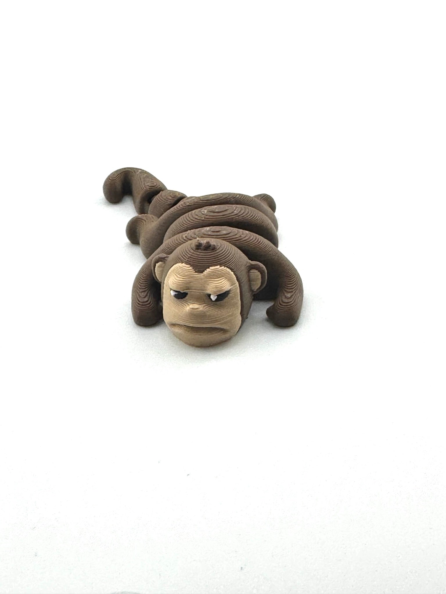 Tango the Monkey Grumpy Edition Flexlings collectible fidget toy with grumpy expression