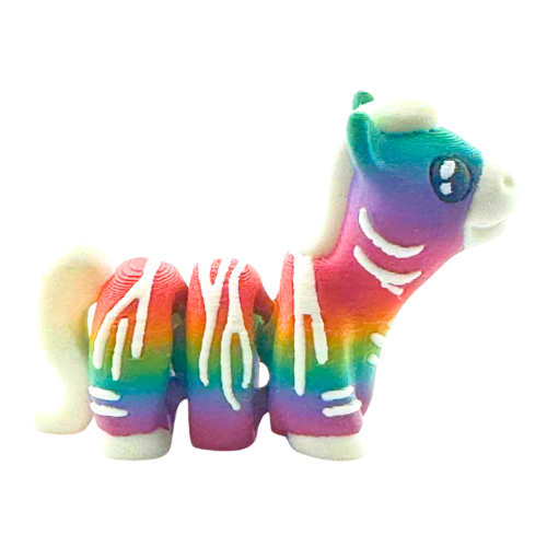 Debra the Zebra Rainbow Edition Flexling toy with gradient colors flowing across white stripes, palm-sized collectible