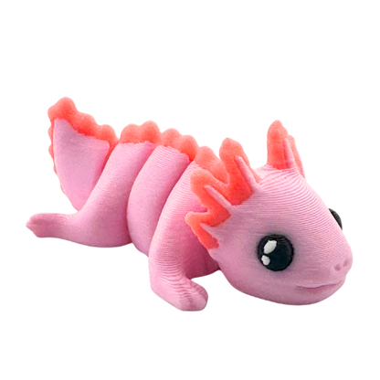 Lumi the Axolotl poseable toy in soft pink finish with frilly gills, part of Flexlings Original Crew limited edition