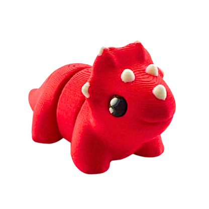 Trixie the Triceratops red glossy articulated toy figure from Flexlings Original Crew limited edition