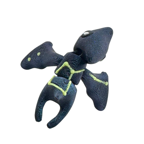 Lamar the Pteranodon Constellation Edition glow in the dark Flexling toy with galaxy coloring and Musca star pattern