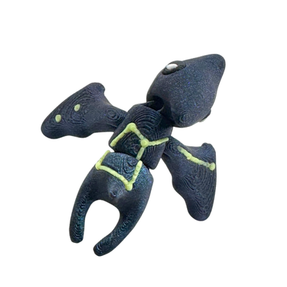 Lamar the Pteranodon Constellation Edition glow in the dark Flexling toy with galaxy coloring and Musca star pattern