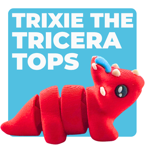 Red triceratops toy with large blue bow on frill, Fancy Edition collectible figure