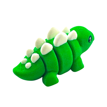 Plato the Stegosaurus green poseable dinosaur toy from Flexlings Original Crew, thoughtful expression, limited edition
