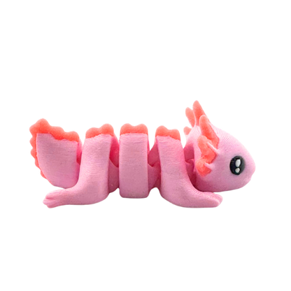 Lumi the Axolotl poseable toy in soft pink finish with frilly gills, part of Flexlings Original Crew limited edition