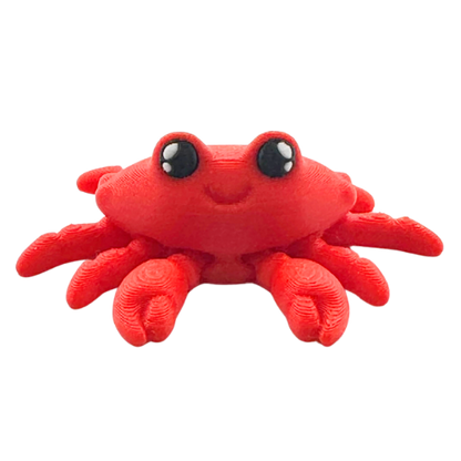 Redd the Crab articulated fidget toy in bright red finish, Original Crew limited edition with flexible limbs