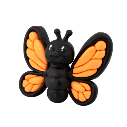 Aurora the Butterfly Flexling with black body and iridescent blue-green wings, poseable collectible toy from Original Crew