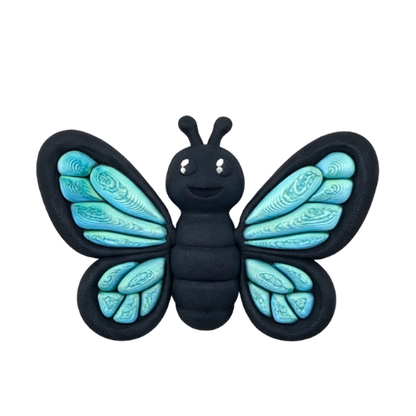 Aurora Butterfly Monarch Queen Flexling toy with orange glow-in-the-dark wings, ultra-limited edition of 23