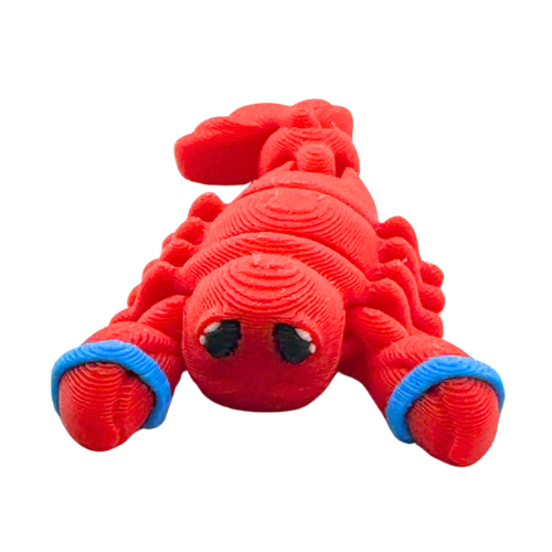 Red poseable lobster toy with blue rubber bands on claws, Clawdia the Lobster Caught Edition by Flexlings